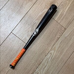 Black Baseball Bat with Orange Grip